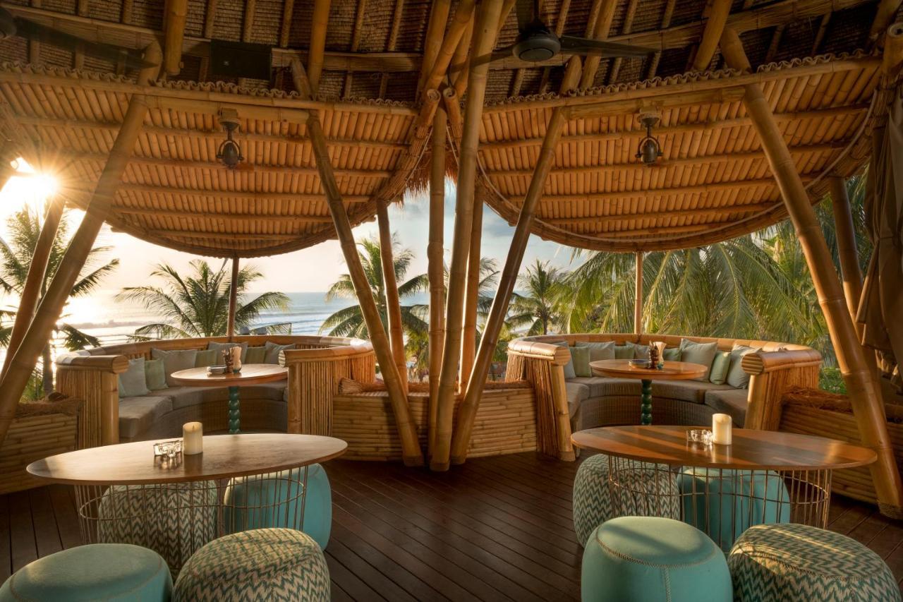 Legian Bali Mandira Beach Resort & Spa מראה חיצוני תמונה The interior of the restaurant